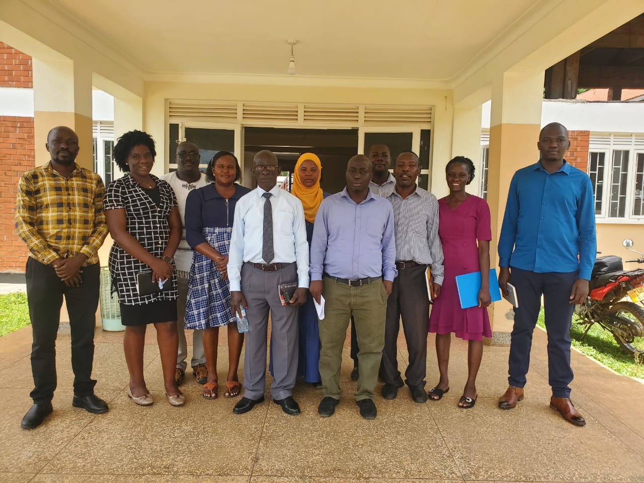 Participants posing for a picture after meeting with DHT and district PLHIV network to conduct joint facility mapping and profiling of PNFP facilities that provide AHD and HIV services in Kamuli MEETING WITH DHT AND DISTRICT PLHIV NETWORK IN KAMULI